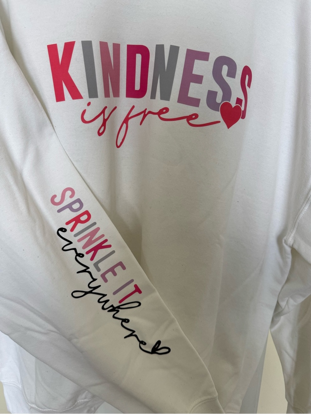 Gildan White Crewneck Sweatshirt with Pink, Red & Gray 'Kindness is Free' Print